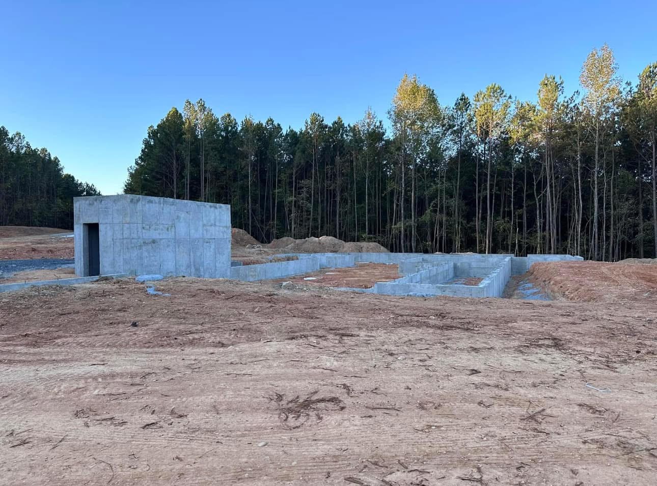 Multi-section foundation pour under clear blue Alabama sky